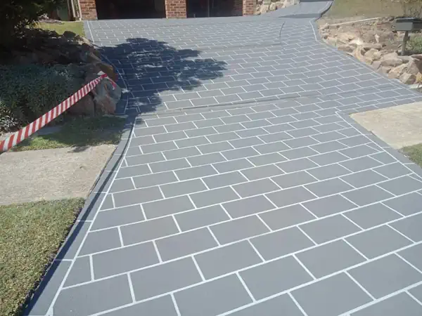 Stenciled concrete using our decorative concrete services on a driveway in Hobart