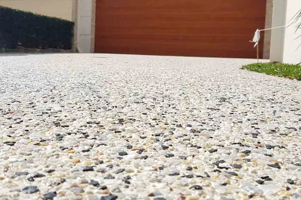 A close up angle of exposed aggregate concrete